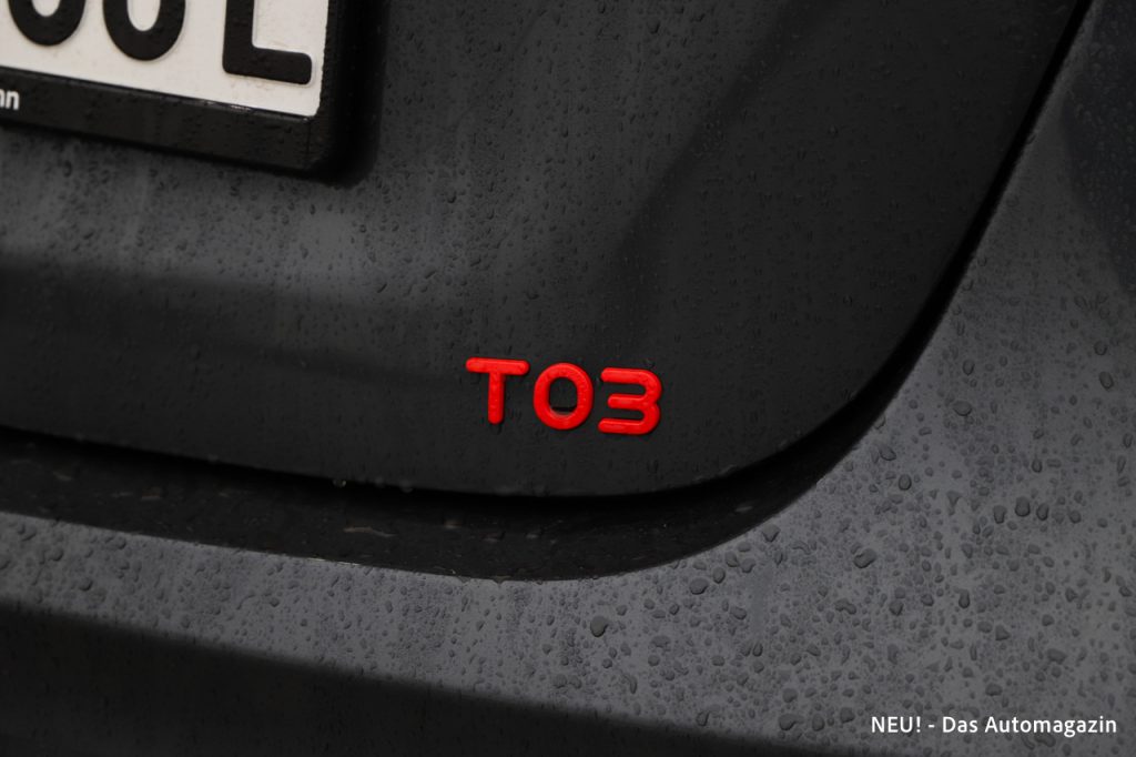 T03 Badge